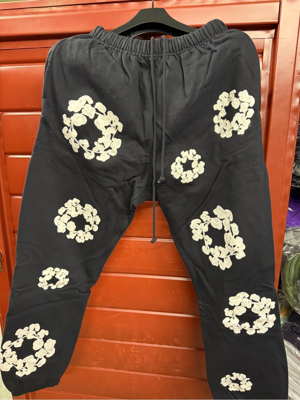 Black Joggers with Cream Floral Wreath Accents